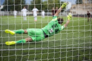 Action du gardin lors d'un match de football